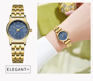 Dettaglio dell'orologio da donna GEDI dorato con quadrante blu e cinturino in metallo