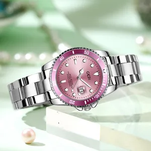 Montre Gedi pour femme en acier argenté avec cadran rose et calendrier sur fond vert