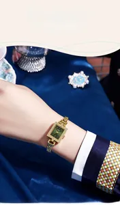 Elegant gold square quartz watch with vintage green dial and shimmering diamond-set bezel