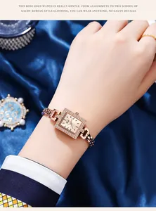 Macro shot of rose gold square quartz watch with crystal bezel on blue silk