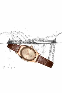 Macro detail of GEDI leather watch showing 3ATM water resistance with water splash effect
