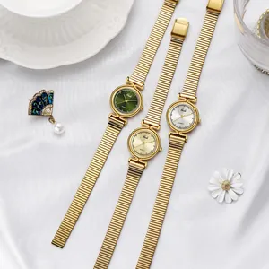 Montres Gedi élégantes pour femmes en or avec cadrans vert, doré et blanc sur soie