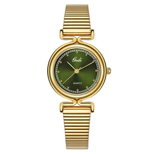 Montre à quartz Gedi vintage pour femme avec cadran vert foncé et bracelet doré