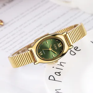 Elegante GEDI Damenuhr mit smaragdgrünem ovalen Zifferblatt und goldener Stahlband