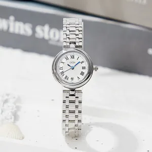 Montre à Quartz pour Femme Luxe Bracelet en Acier Inoxydable Étanche Avec Calendrier Chiffres Romains Élégante