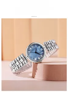 Detail view of the silver metal strap and vintage blue mother-of-pearl watch face