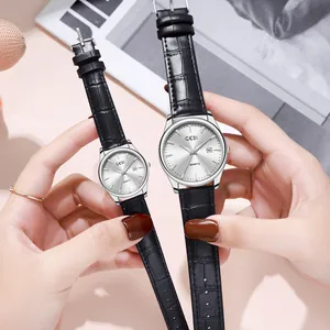 Montres à quartz pour couple avec bracelets en cuir noir et cadran argenté