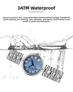 Waterproof women's quartz watch with blue shell dial and silver chain band in water splash