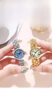 Close-up of elegant small round GEDI watches with Roman numerals and metal link bracelets