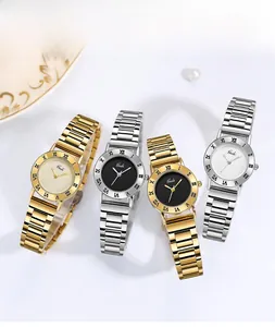 Detailed view of four stainless steel quartz watches with Roman numeral bezels and luxury bands