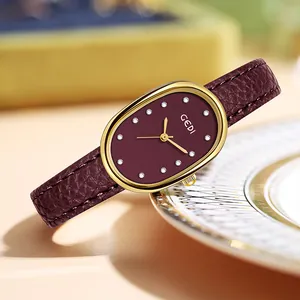 GEDI Montre à Quartz Élégante pour Femmes Cadran Ovale en Nacre Montre Bracelet Imperméable Avec Bracelet en Cuir Texture Litchi Index en Strass