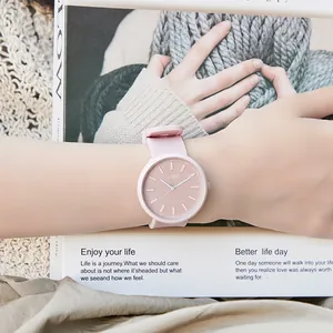 Minimalist light pink quartz watch for women with silicone strap and GEDI logo