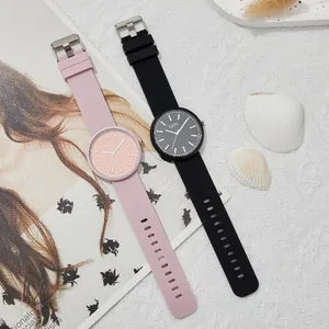 GEDI minimalist quartz wristwatches with candy-colored silicone straps in pink and black