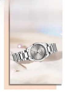 Detailed macro shot of GEDI silver stainless steel quartz watch with crystal indices
