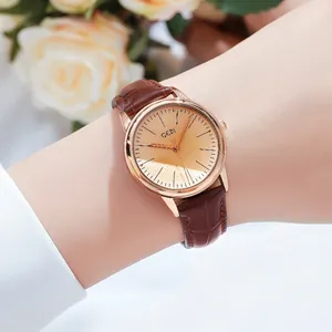 GEDI minimalist women's watch with champagne dial and brown leather bamboo strap