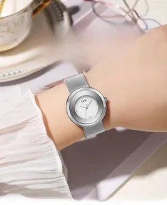 Detail of silver mesh band watch with diamond markers and water-resistant quartz movement