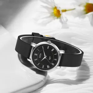 GEDI minimalist waterproof quartz watch with black silicone strap and Roman numerals dial