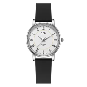 Minimalist GEDI quartz watch with white Roman dial and black silicone strap on white background