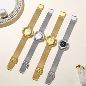 Minimalist women's mesh band watch collection with round dial and crystal detail