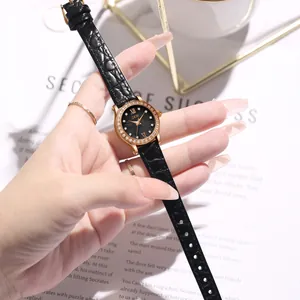 Luxury rose gold quartz watch for women with rhinestone bezel and black leather strap