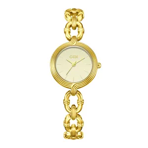 Elegante reloj de pulsera con cadena dorada para mujer y esfera redonda color champán