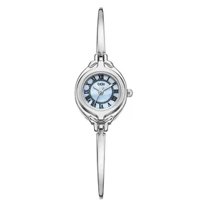 Montre jonc GEDI rétro argentée pour femme avec cadran nacré bleu clair et chiffres romains