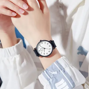 Minimalist quartz watch with white dial and cartoon bear detail on black strap