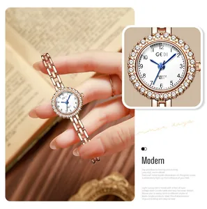 Detailed close-up of GEDI 6251 watch with rose gold metal strap and crystal bezel