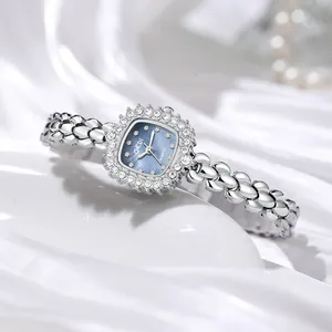 Gedi Montre à Quartz Luxe Femme Bracelet Chaîne Tournesol Incrusté de Strass Cadran en Nacre Mode Montre Bracelet Étanche