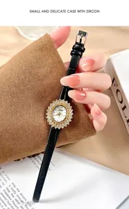 Detailansicht der Gedi Damen-Luxusuhr mit Zirkon-Sonnenblumen-Lünette und schwarzem Lederband