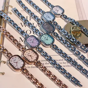 Elegant GEDI women's quartz watch with oval dial and solid metal link bracelet