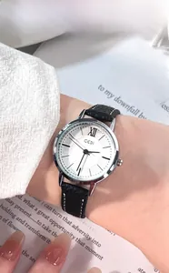 Detail of GEDI vintage women's watch with black leather strap and Roman numeral silver dial