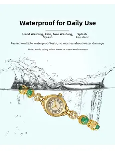 Waterproof vintage gold watch with green gemstones and coin-shaped chain detail
