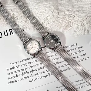 Elegant square Gedi quartz watch for women with silver mesh band and black or white dials
