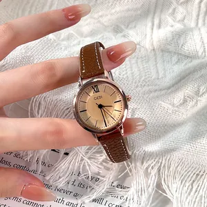Gedi vintage minimalist women's watch with rose gold dial and brown leather strap