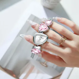 Elegant women's watch with pink crystal strap and unique triangular dial for a luxury look