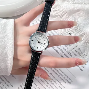 Retro minimalist women's quartz watch with silver alloy case and black leather strap
