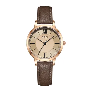 Vintage GEDI women's watch with rose gold case, brown leather strap and champagne sunray dial