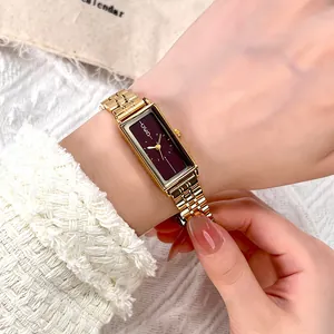 Elegant GEDI gold rectangle steel watch with deep burgundy dial and minimalist indices