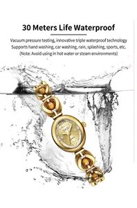 Detail view of GEDI emerald-toned quartz bracelet watch submerged in splashing water