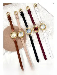 Vue de cinq montres à quartz GEDI avec bracelets en cuir colorés et cadrans en nacre