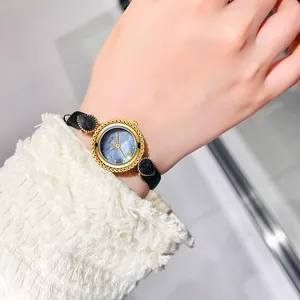 Montre GEDI pour femme avec cadran nacré bleu et bracelet en cuir noir élégant