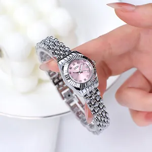 Elegante Quarz-Damenuhr mit rosa Zifferblatt, Silberarmband und geriffelter Lünette