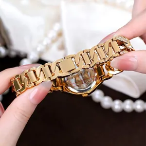 Elegant gold quartz watch for women with sparkling crystal accents and a link bracelet