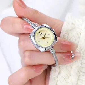 Elegant GEDI quartz watch featuring a silver cable wire strap and swan logo dial