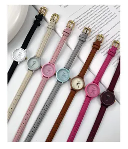 Detail showing seven colors of minimalist quartz watches with slim leather straps