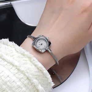 Elegant GEDI women silver metal chain bracelet watch with a square dial on wrist