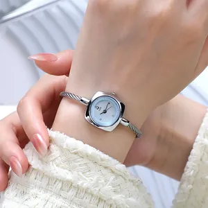 Women's silver cable bracelet watch with a light blue swan-themed square dial