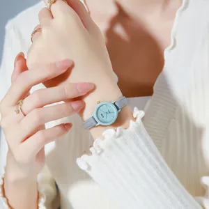 Elegant GEDI women's quartz watch with light blue dial and slim grey leather strap