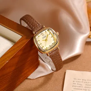 Montre carrée dorée élégante pour femme avec bracelet en cuir marron et cadran satiné